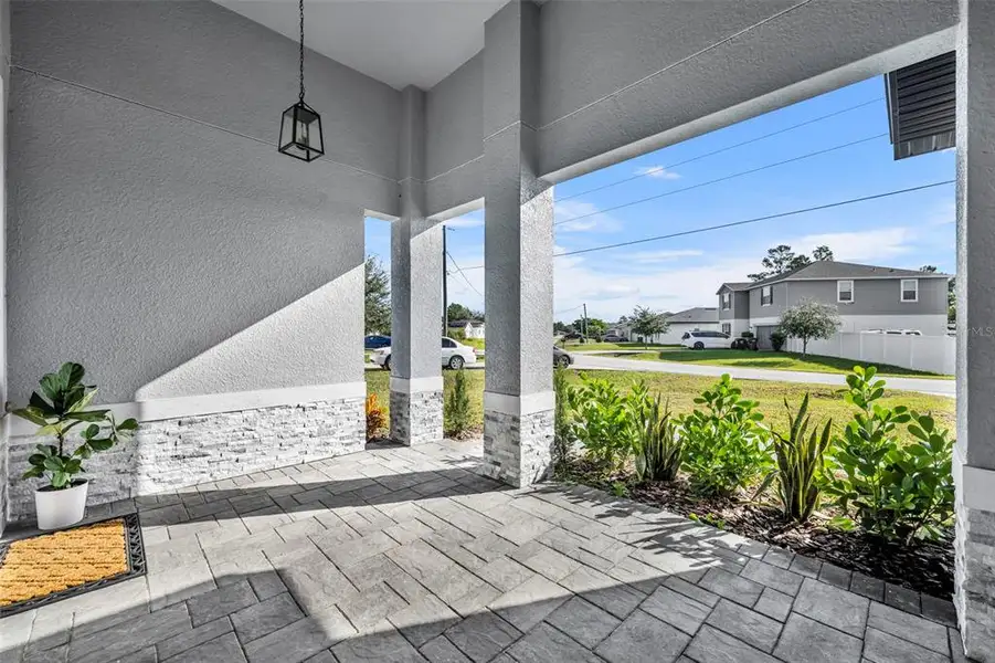 Exterior details and patio area of a home in , Poinciana (Image 3). Exterior details and patio area of a home in , Poinciana (Image 3).