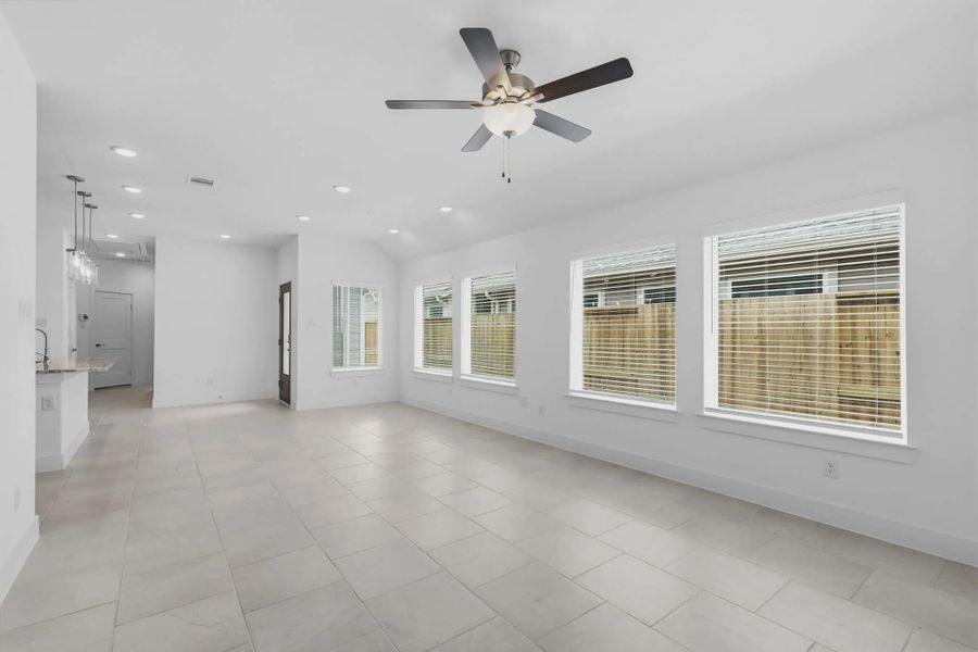 Representative unfurnished interior of a home built from the Carriagehouse by Chesmar Homes in Meridiana Townhomes, Iowa Colony (Image 25).