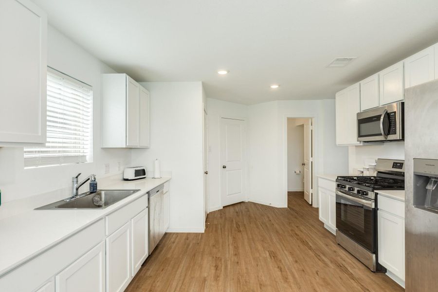 Furnished interior view inside a new home in Windrose Green, Angleton (Image 7).