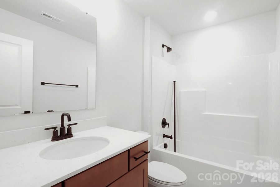 Furnished interior view inside a new home in Sylvan Creek, Denver (Image 10).