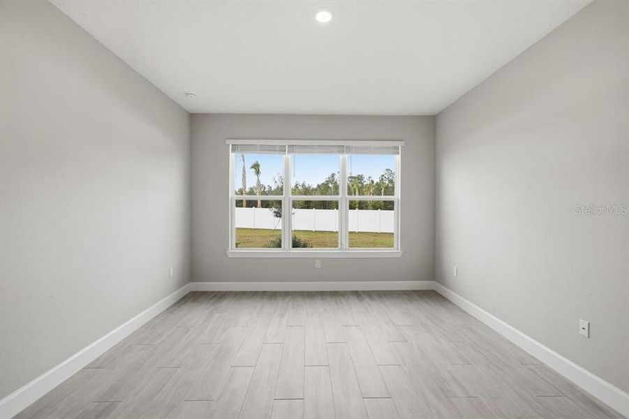 Spacious, unfurnished interior of a new home in Esplanade at Westview, Kissimmee (Image 34).