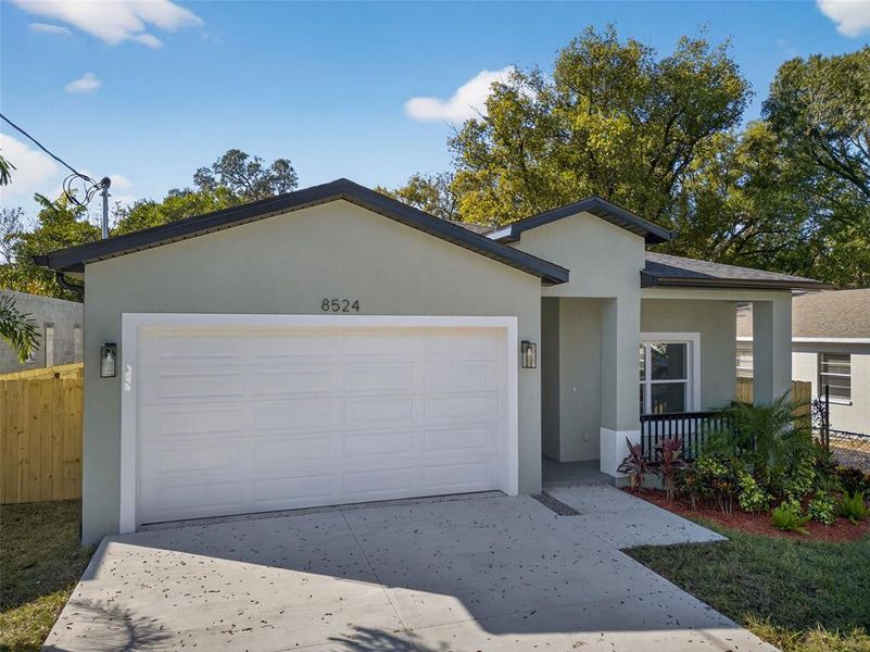 Front exterior of a new home in , Tampa, FL, highlighting curb appeal (Image 28). Front exterior of a new home in , Tampa, FL, highlighting curb appeal (Image 28).