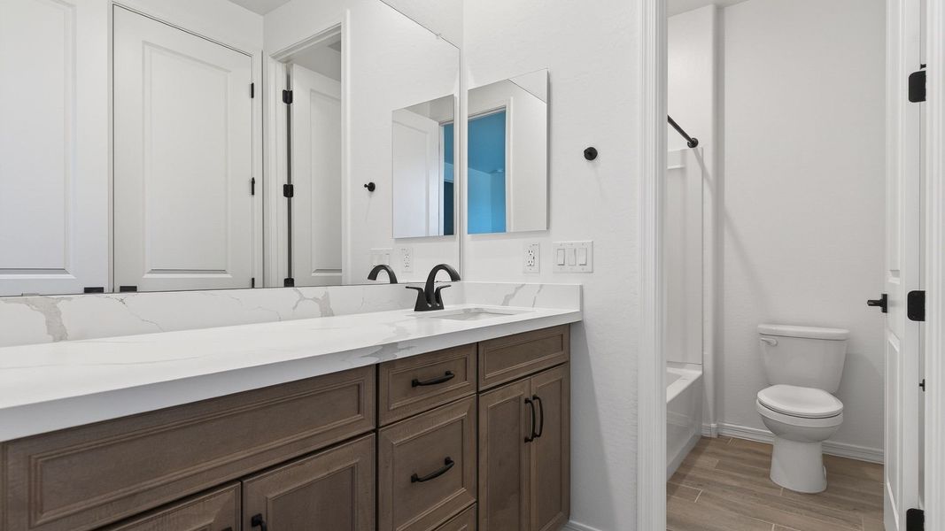 Furnished interior view inside a new home in The Grove at El Cidro, Goodyear (Image 11).