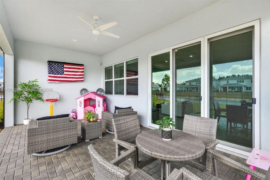 Fully furnished outdoor spaces convey, ready for entertaining and relaxation.