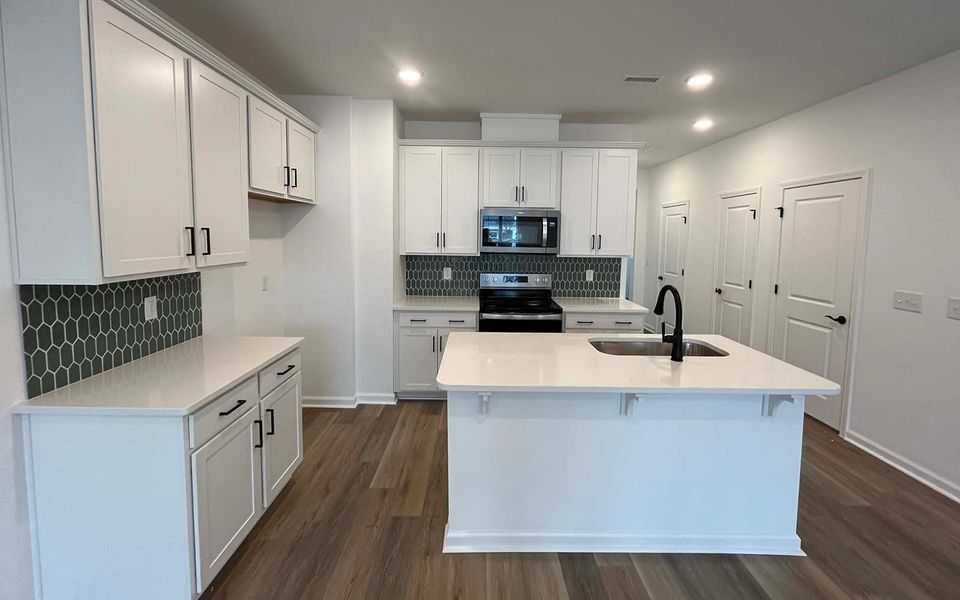 Furnished interior view inside a new home in Townhomes at Wendell Falls, Wendell (Image 6).