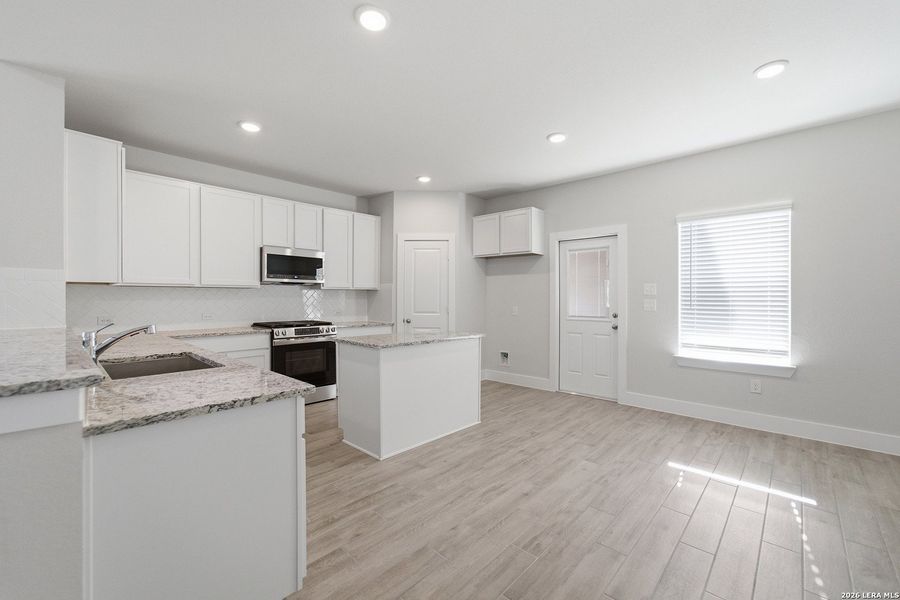 Furnished interior view inside a new home in Morgan Meadows, San Antonio (Image 6).