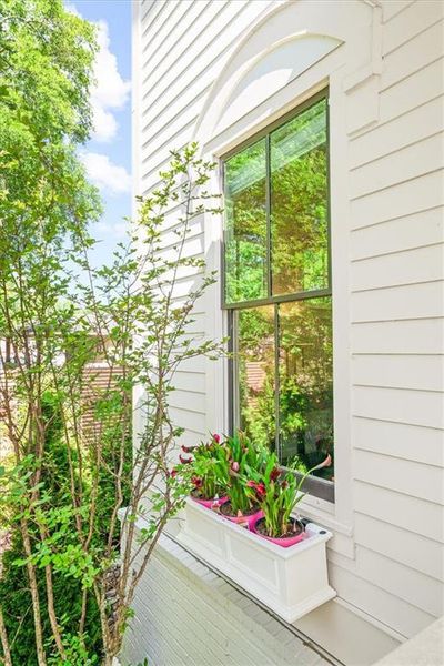 Exterior details and patio area of a home in Manning on the Square, Alpharetta (Image 24).