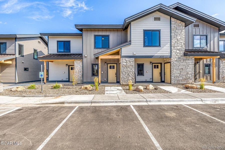 Front exterior of a new home in , Granby, CO, highlighting curb appeal (Image 21).