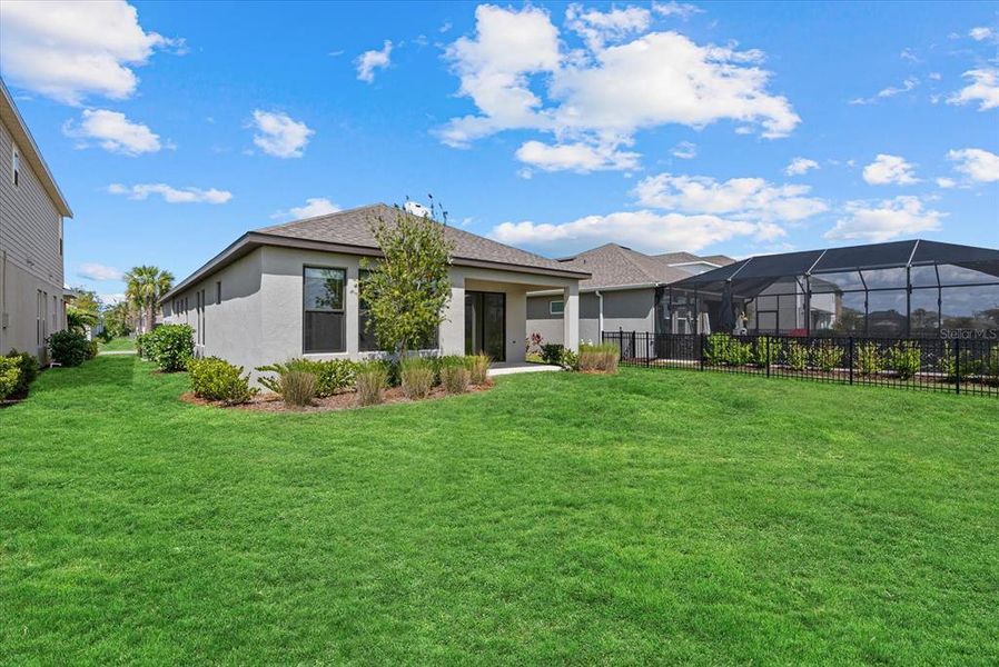 Exterior details and patio area of a home in Park East at Azario, Bradenton (Image 27).