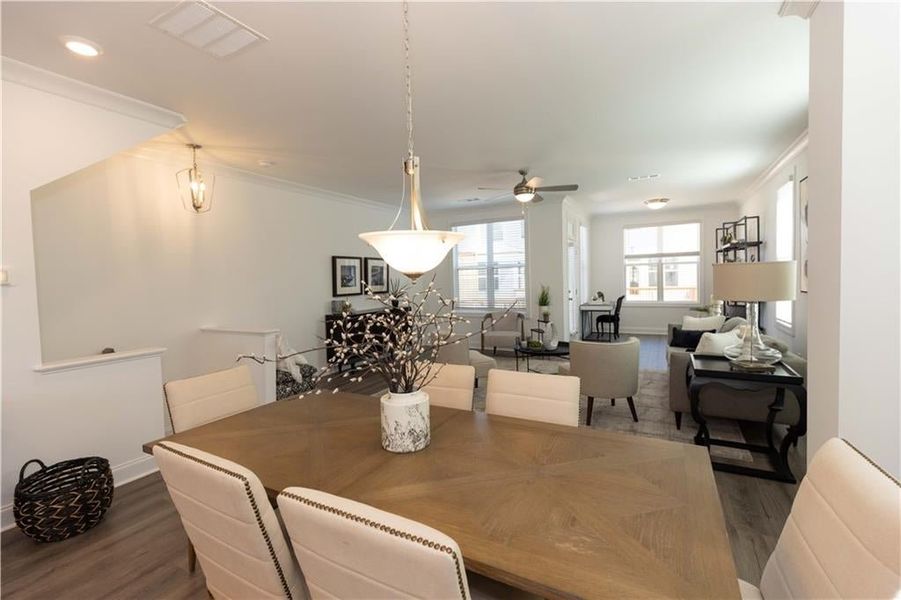 Dining area. *Photos of model home from a different community. Used for illustrative purposes only.*