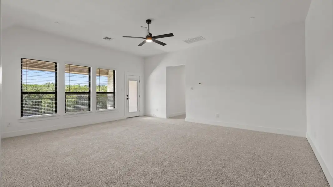 Spacious, unfurnished interior of a new home in Sweetwater, Austin (Image 24).