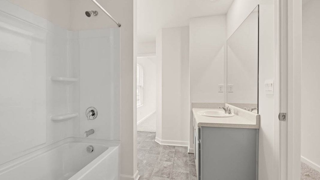 Representative furnished interior of a home built from the Packard by D.R. Horton in Evergreen Crossing, Locust Grove (Image 12).
