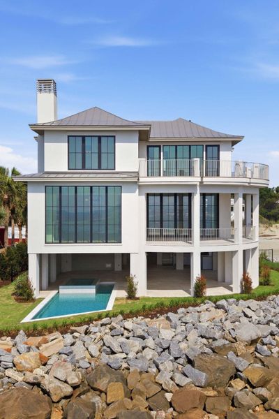 Front exterior of a new home in , Sullivan's Island, SC, highlighting curb appeal (Image 32).