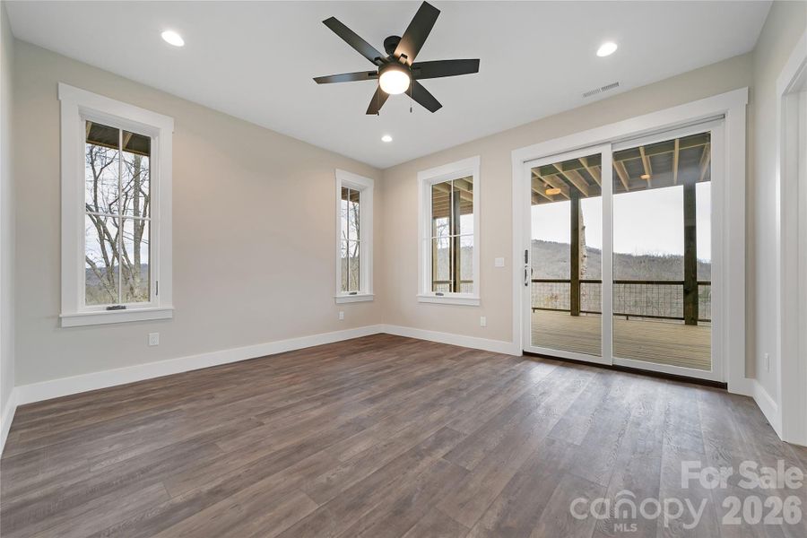 Spacious, unfurnished interior of a new home in , Pisgah Forest (Image 36).