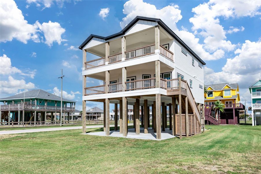 Front exterior of a new home in , Bolivar Peninsula, TX, highlighting curb appeal (Image 28).