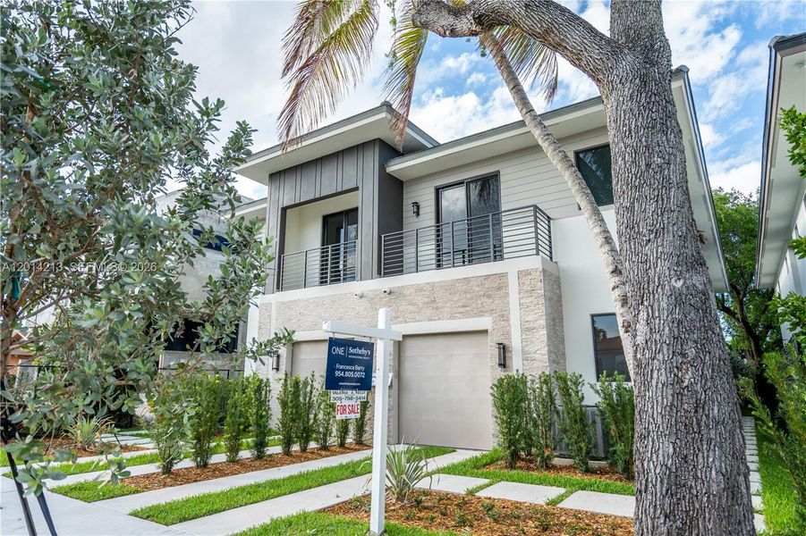 Front exterior of a new home in , Miami, FL, highlighting curb appeal (Image 25). Front exterior of a new home in , Miami, FL, highlighting curb appeal (Image 25).