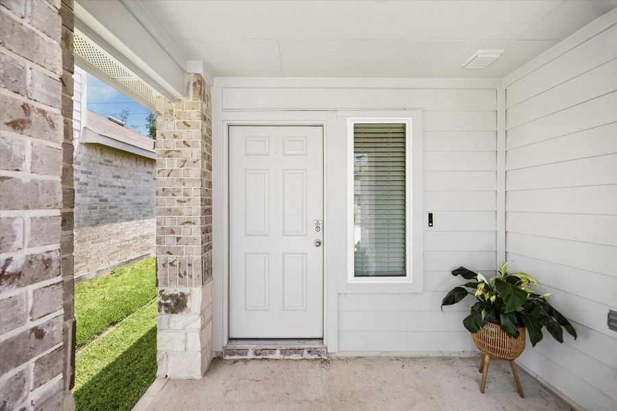 Exterior details and patio area of a home in , Spring (Image 3).
