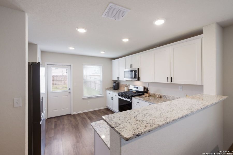 Furnished interior view inside a new home in Winding Brook, San Antonio (Image 16).