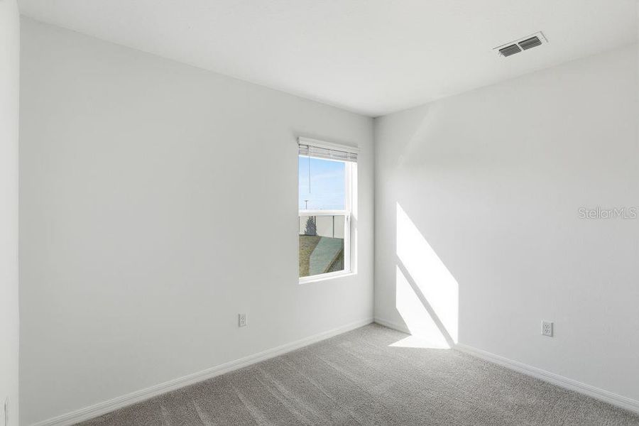 Spacious, unfurnished interior of a new home in Waterstone, Groveland (Image 27).