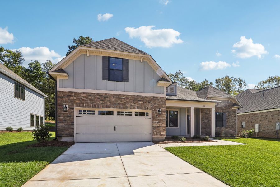 Representative exterior photo of a completed home built from the Edisto II by Great Southern Homes in The Cove, Sumter, SC (Image 15). Representative exterior photo of a completed home built from the Edisto II by Great Southern Homes in The Cove, Sumter, SC (Image 15).