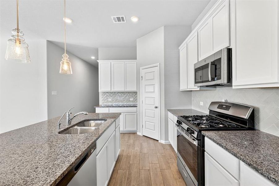 Furnished interior view inside a new home in Mobberly Farms, Pilot Point (Image 8). Furnished interior view inside a new home in Mobberly Farms, Pilot Point (Image 8).