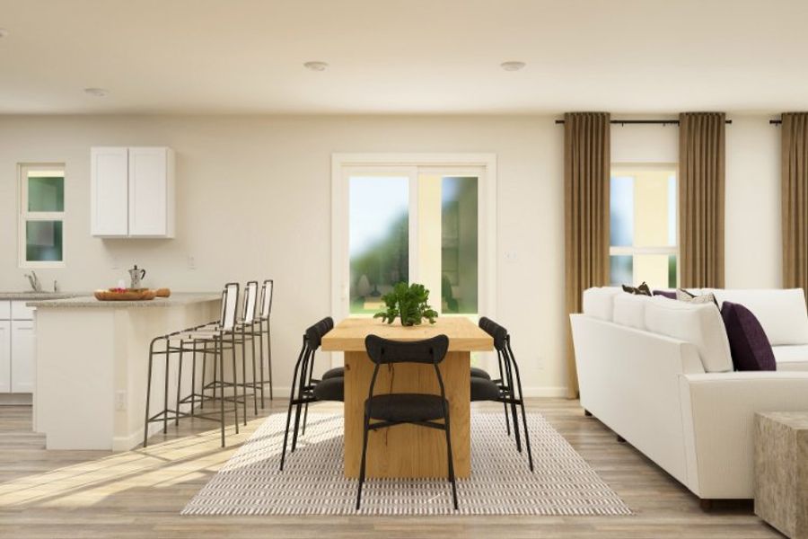 A living room with a dining table and chairs.