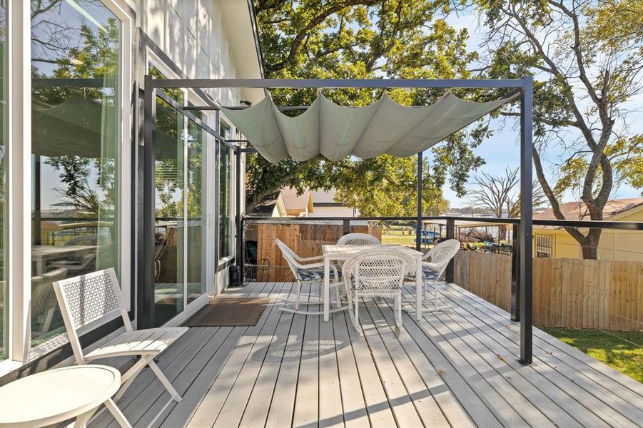 Wooden terrace featuring outdoor dining space