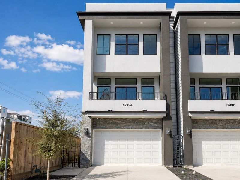 Newly constructed 3 story single family home with a private driveway and fenced backyard Newly constructed 3 story single family home with a private driveway and fenced backyard