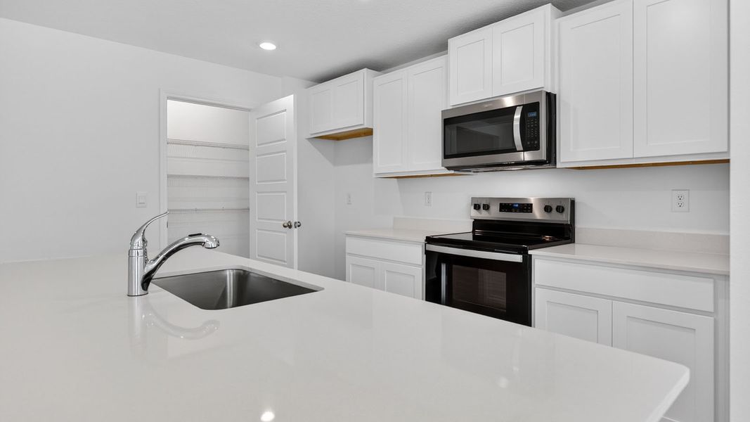 Representative furnished interior of a home built from the Aria+ by D.R. Horton in The Arbors, Jacksonville (Image 4).