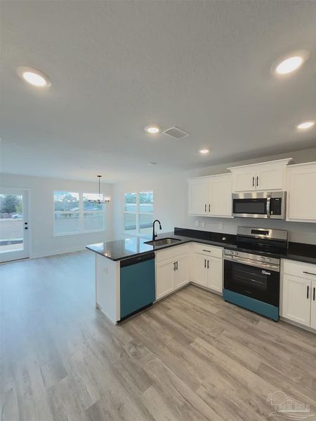 Furnished interior view inside a new home in Allison Acres, Cantonment (Image 6).