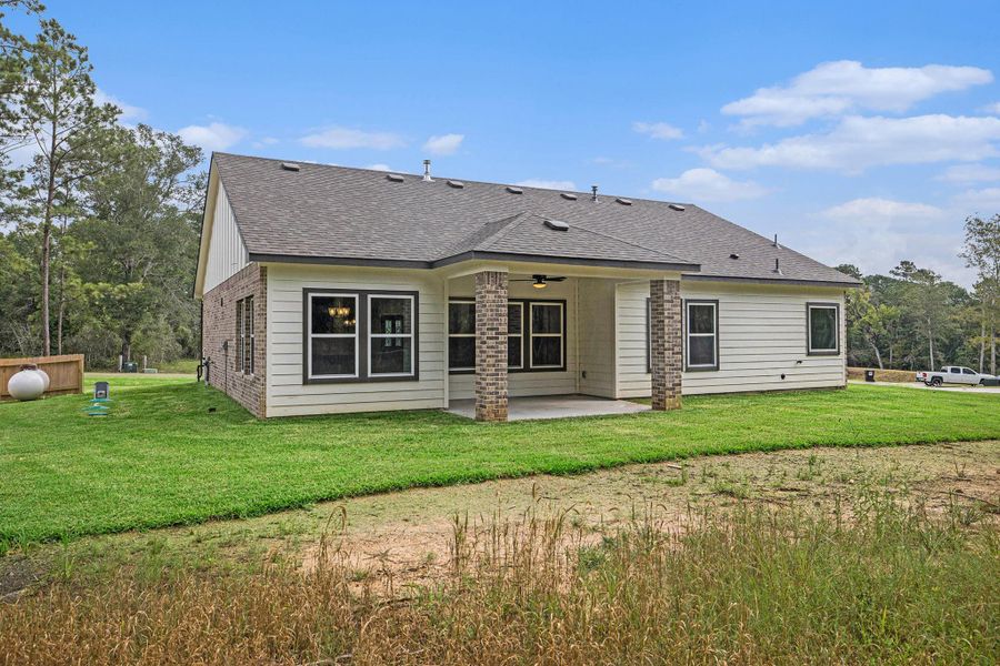 Front exterior of a new home in Oakwood Ranch, Willis, TX, highlighting curb appeal (Image 19). Front exterior of a new home in Oakwood Ranch, Willis, TX, highlighting curb appeal (Image 19).