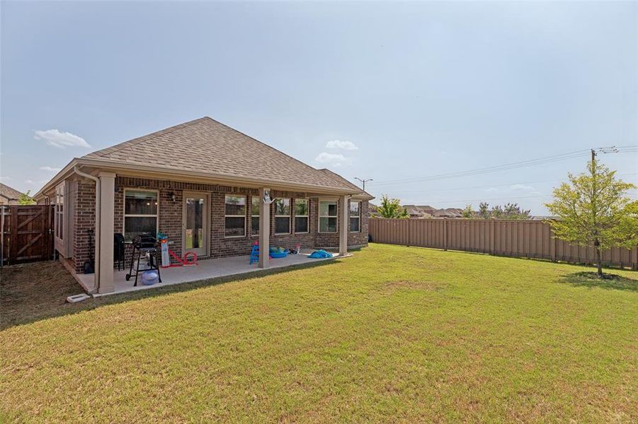 Exterior details and patio area of a home in Light Farms - Sweetwater, Celina (Image 3). Exterior details and patio area of a home in Light Farms - Sweetwater, Celina (Image 3).