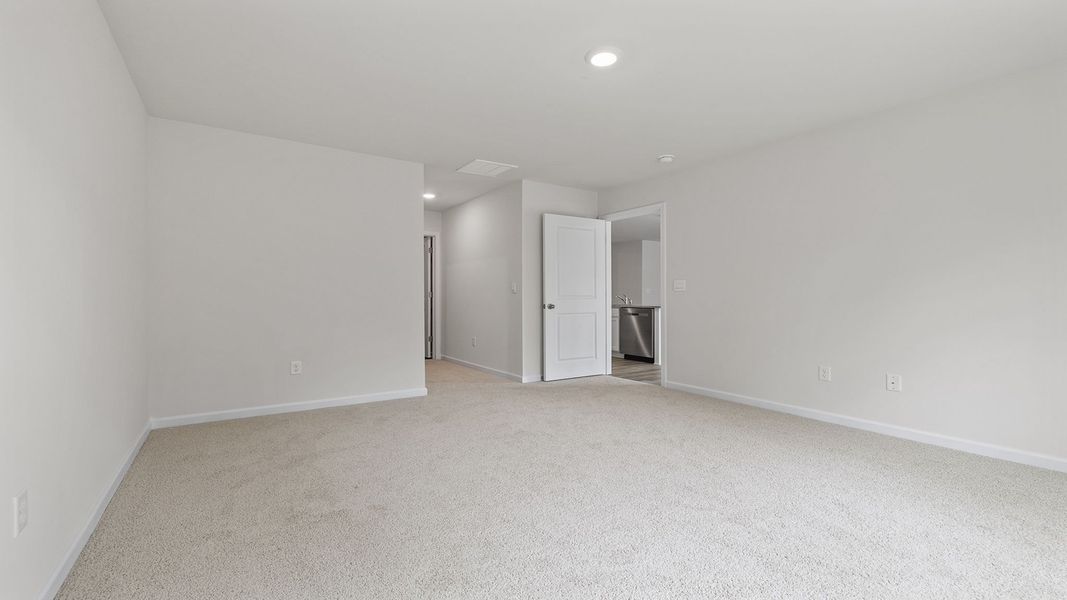 Spacious, unfurnished interior of a new home in Durbin Meadows Traditions, Fountain Inn (Image 25).