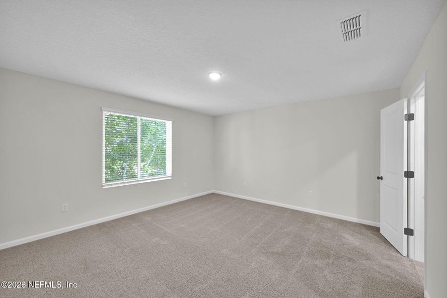 Spacious, unfurnished interior of a new home in Baxley Villas, Middleburg (Image 18).