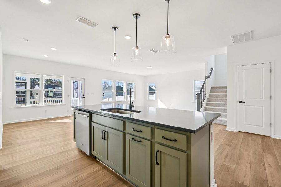 Kitchen featuring the AW Collection® Rosemary - Matte black, light wood, and garden-inspired style