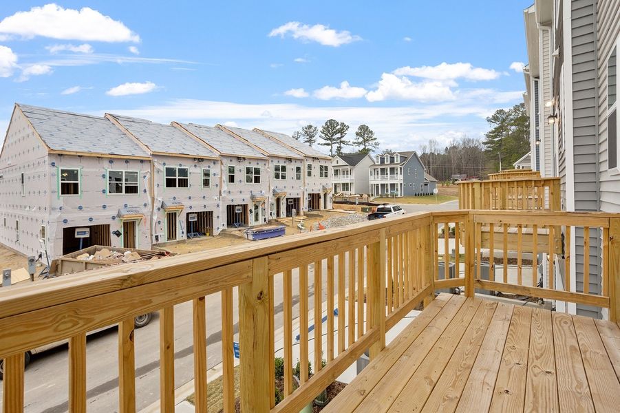 Exterior details and patio area of a home in Renaissance at White Oak, Garner (Image 3).