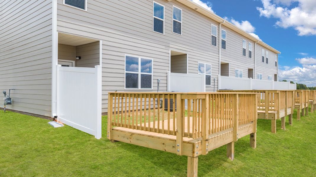 Front exterior of a new home in The Parish at Flat Rock Townhomes, Graniteville, SC, highlighting curb appeal (Image 21). Front exterior of a new home in The Parish at Flat Rock Townhomes, Graniteville, SC, highlighting curb appeal (Image 21).