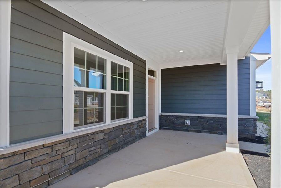 Exterior details and patio area of a home in Canterbrook Farms 2-Story, Fountain Inn (Image 3). Exterior details and patio area of a home in Canterbrook Farms 2-Story, Fountain Inn (Image 3).