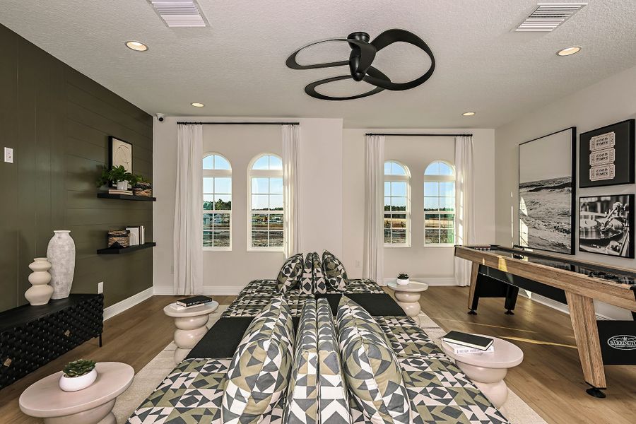 Representative furnished interior of a home built from the Key Largo II by Homes by WestBay in Barrington Preserve, Brandon (Image 28).