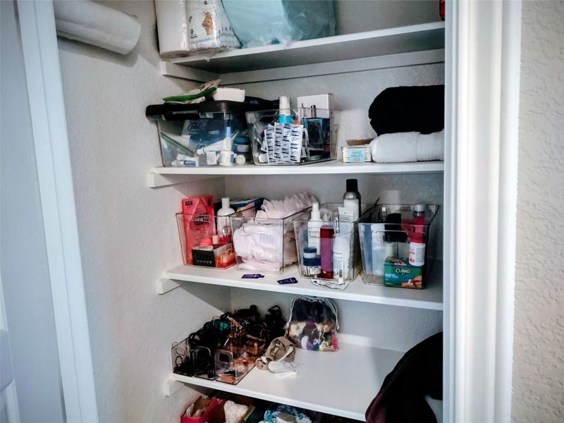 View of Linen Closet in Primary Bathroom