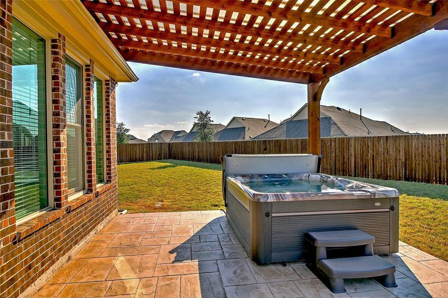 Exterior details and patio area of a home in Preserve at Honey Creek: Brookstone Collection, McKinney (Image 4).