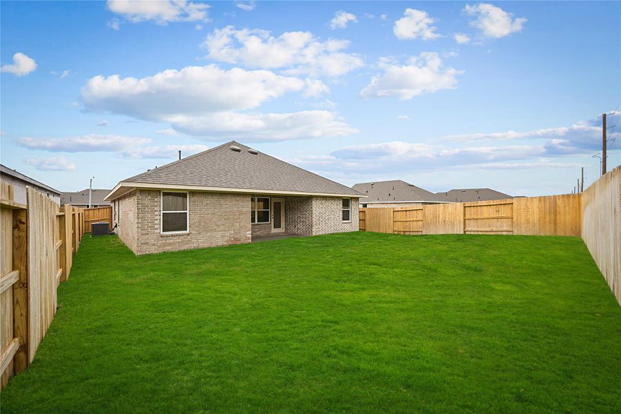 Exterior details and patio area of a home in River Ranch Trails, Dayton (Image 13). Exterior details and patio area of a home in River Ranch Trails, Dayton (Image 13).