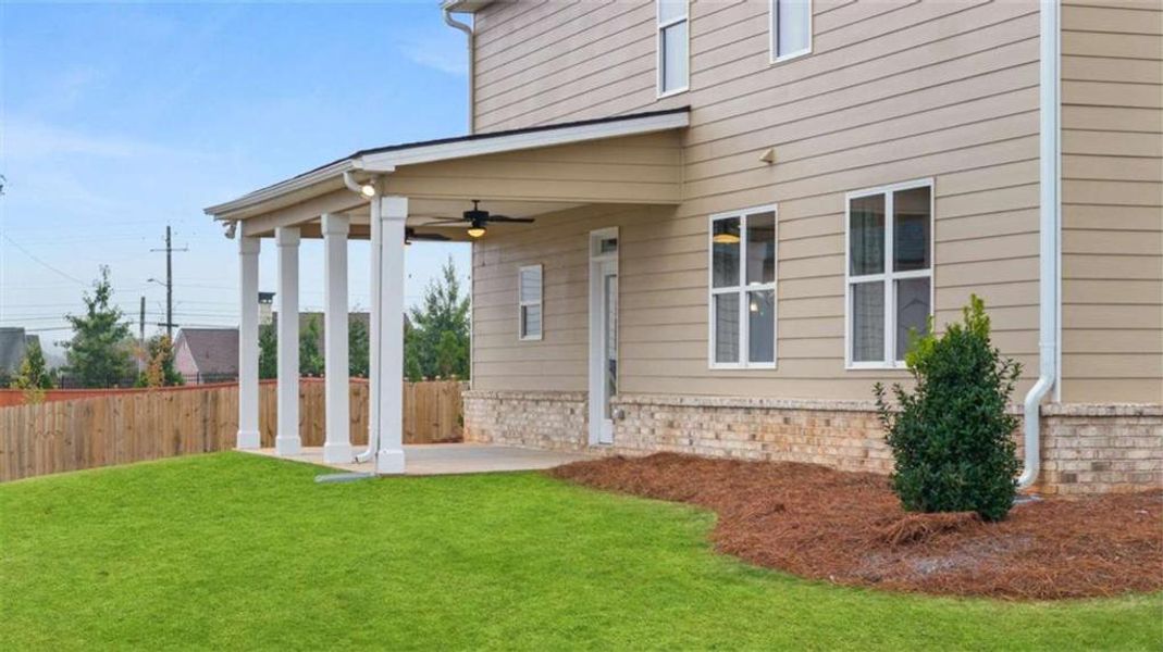 Exterior details and patio area of a home in The Gates at Pates Creek, Hampton (Image 3).