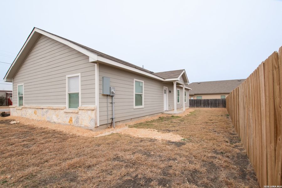 Exterior details and patio area of a home in , New Braunfels (Image 16).