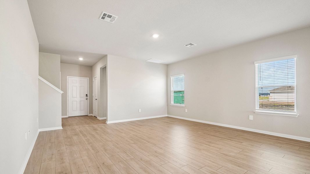 Spacious, unfurnished interior of a new home in Carillon, Manor (Image 12).