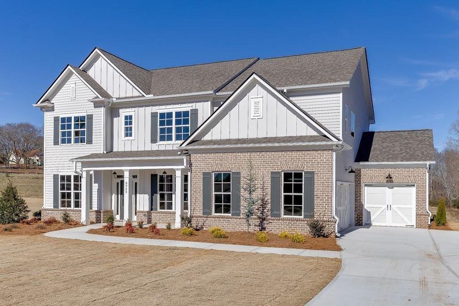 Front exterior of a new home in , Gainesville, GA, highlighting curb appeal (Image 21).