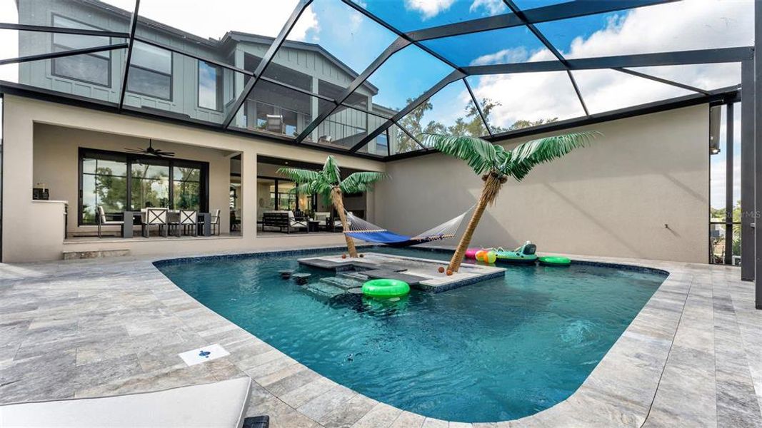 Exterior details and patio area of a home in Delphi Hills, Lakeland (Image 34).