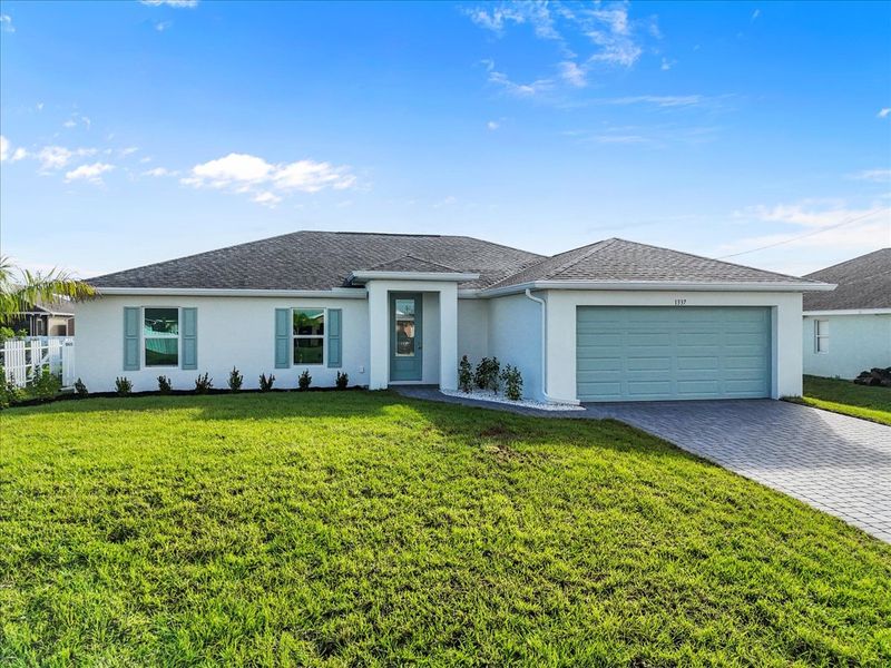 Representative exterior photo of a completed home built from the The Sunset Harbor with Pool by Sunlife Homes LLC in Cape Coral, Cape Coral, FL (Image 2). Representative exterior photo of a completed home built from the The Sunset Harbor with Pool by Sunlife Homes LLC in Cape Coral, Cape Coral, FL (Image 2).