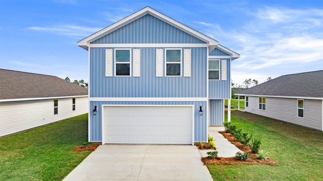 Front exterior of a new home in Titus Park, Panama City, FL, highlighting curb appeal (Image 2). Front exterior of a new home in Titus Park, Panama City, FL, highlighting curb appeal (Image 2).