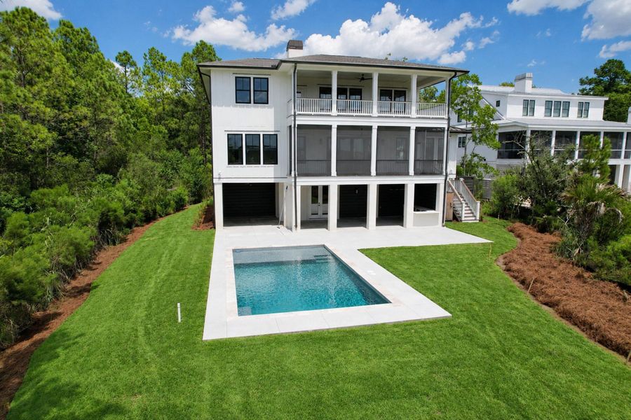 Exterior details and patio area of a home in , Awendaw (Image 22).